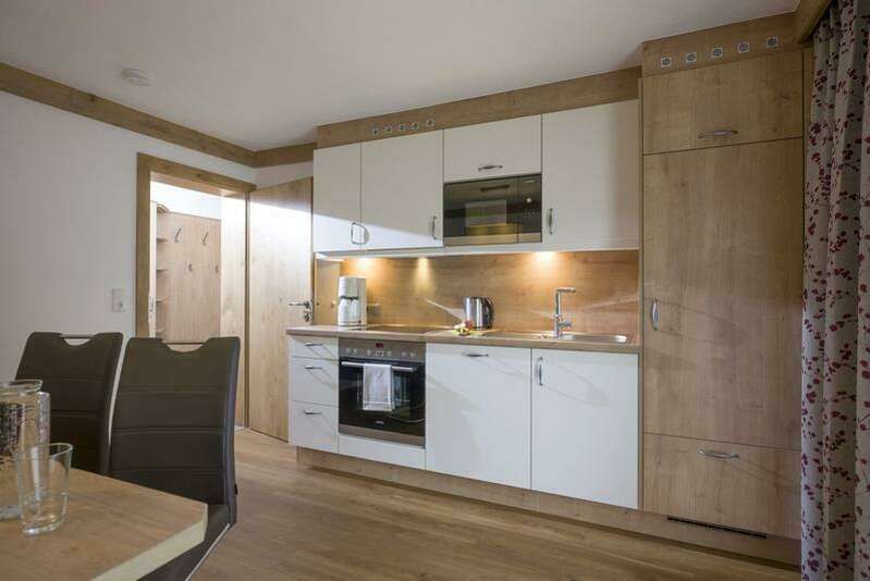 Kitchen in the holiday apartment in the Wiesenheim Zillertal Arena guest house